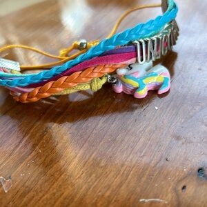 Adjustable bracelet with six strands unicorn theme